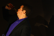 Harry having an illicit swig