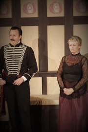 Simon Riordan as Carl Magnus and Lorna Welch as his long-suffering wife Charlotte